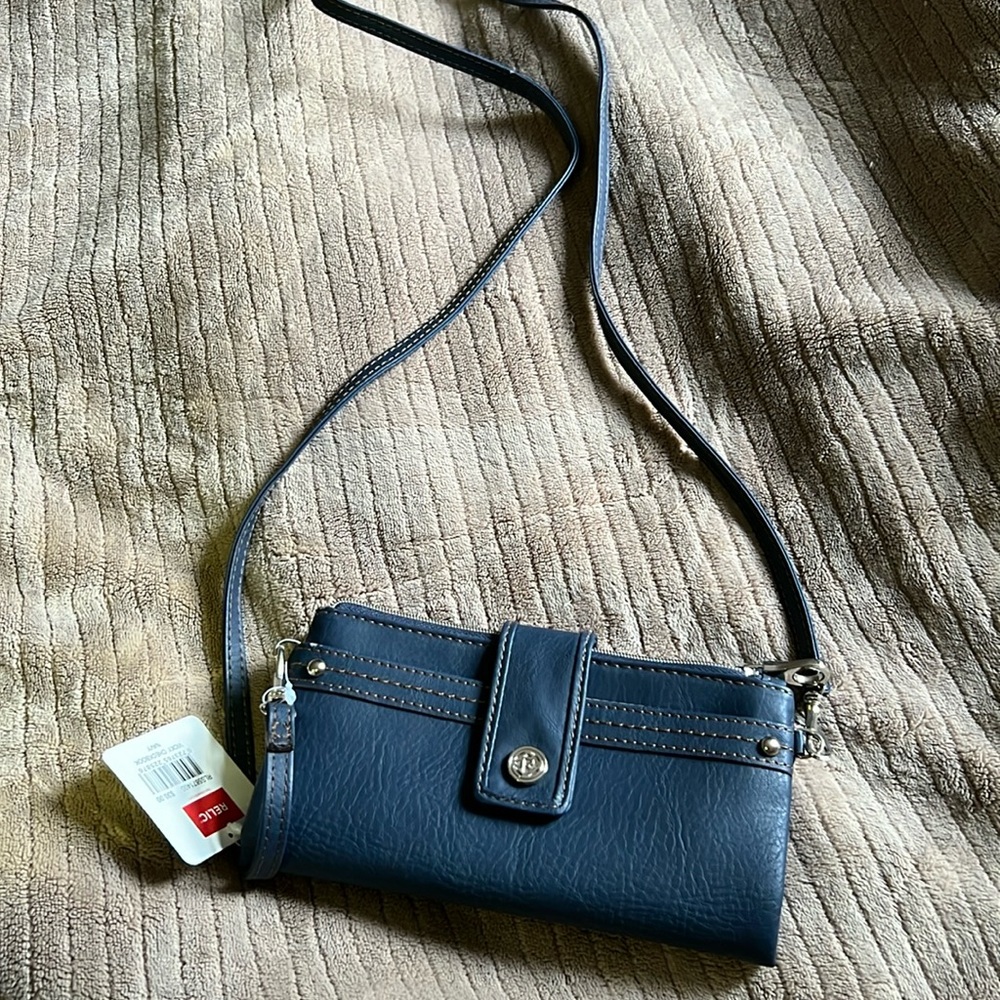 New over the shoulder wallet with tags.
